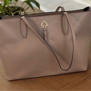Kate Spade Cream Tote with Minimalist Design and Spacious Interior